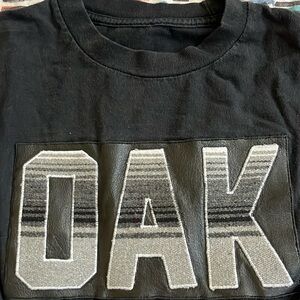 Oakland Raider’s Black Tee w/ Lettering on the Front